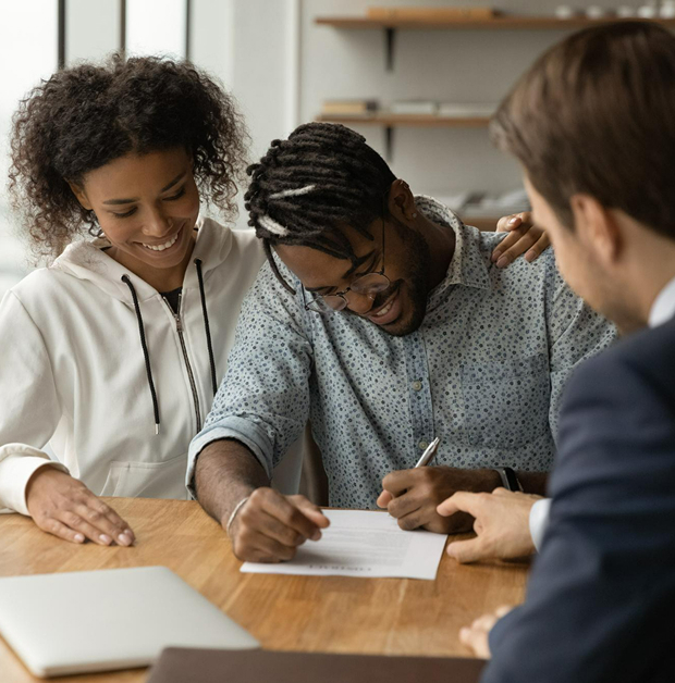 Property manager shaking hands with clients